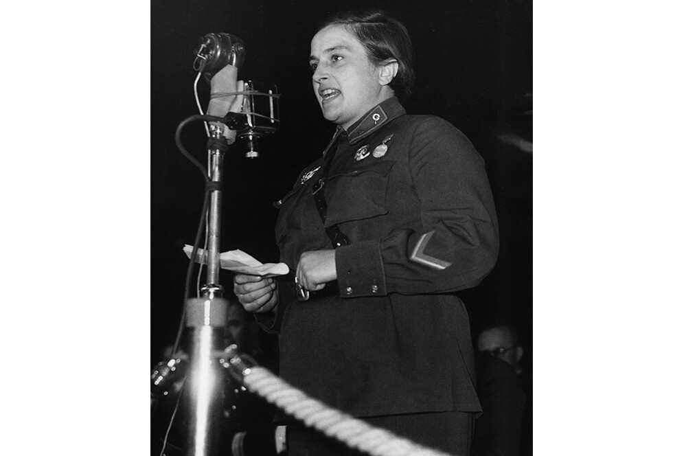 Lyudmilla Pavlichenko, a Soviet lieutenant, addresses an audience at Earl’s Court, in London, during celebrations to mark the 25th anniversary of the Soviet Union. England, November 1942